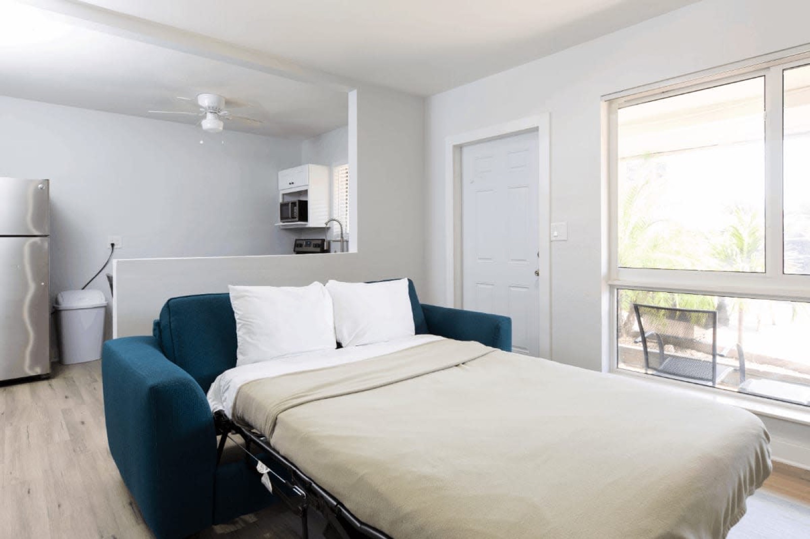 Studio with sleeper sofa bed and kitchenette at Pompano Breeze, Pompano Beach