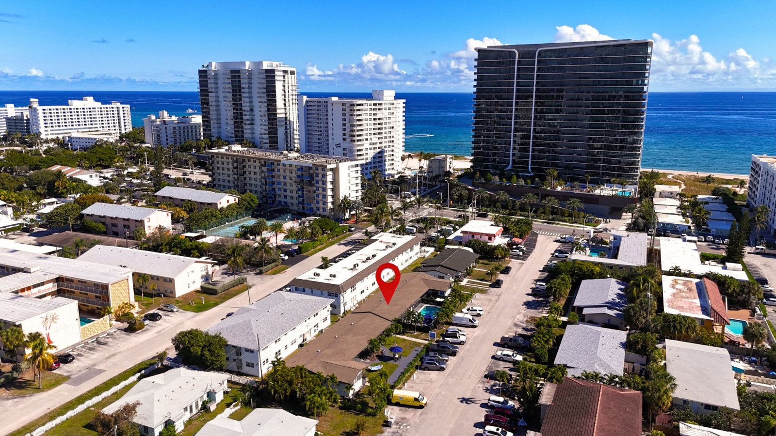 Aerial view of the Pompano Beach neighborhood with a pin marking Pompano Breeze near the ocean