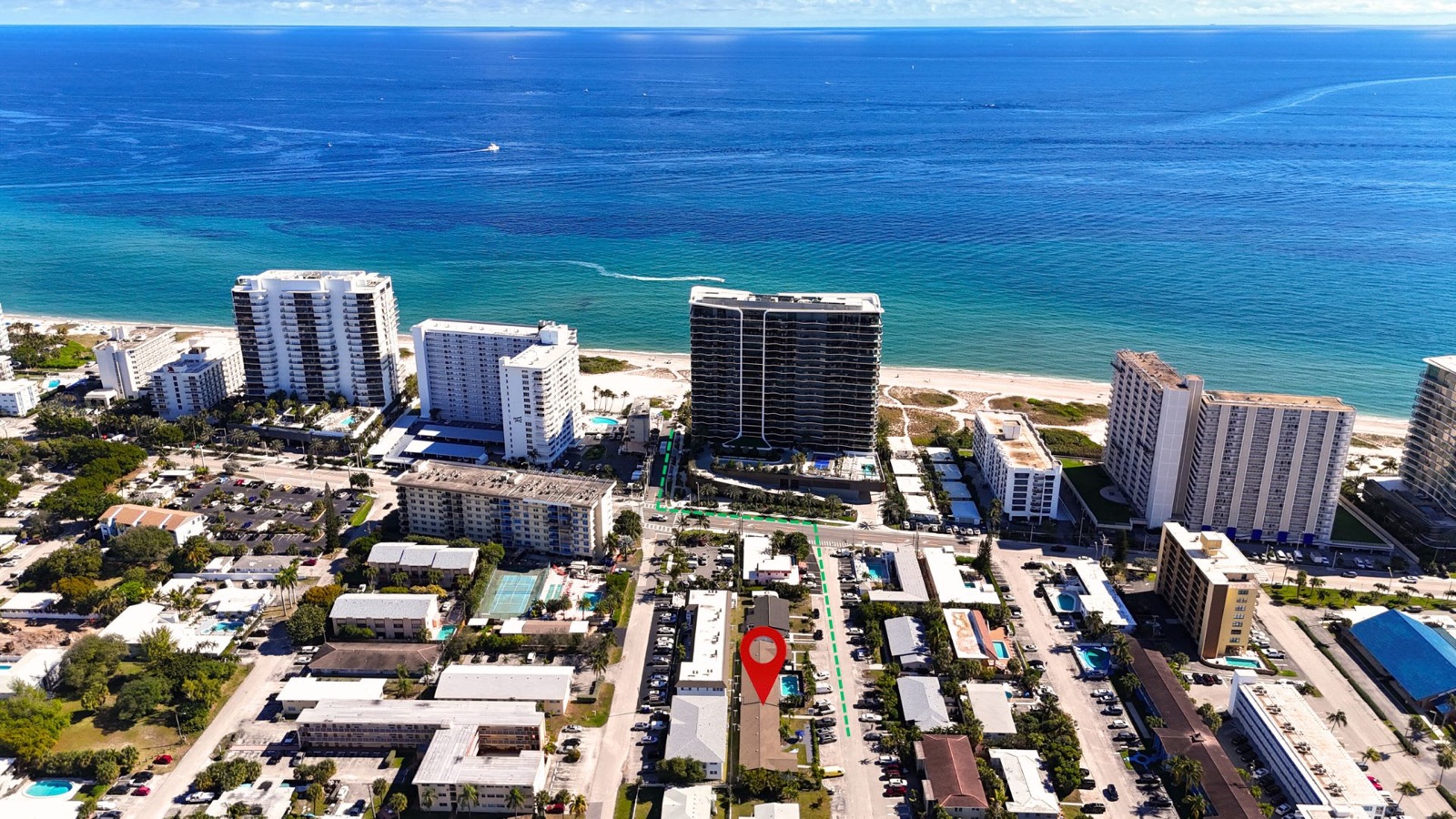 Aerial with ocean view and property pin, Pompano Beach, FL