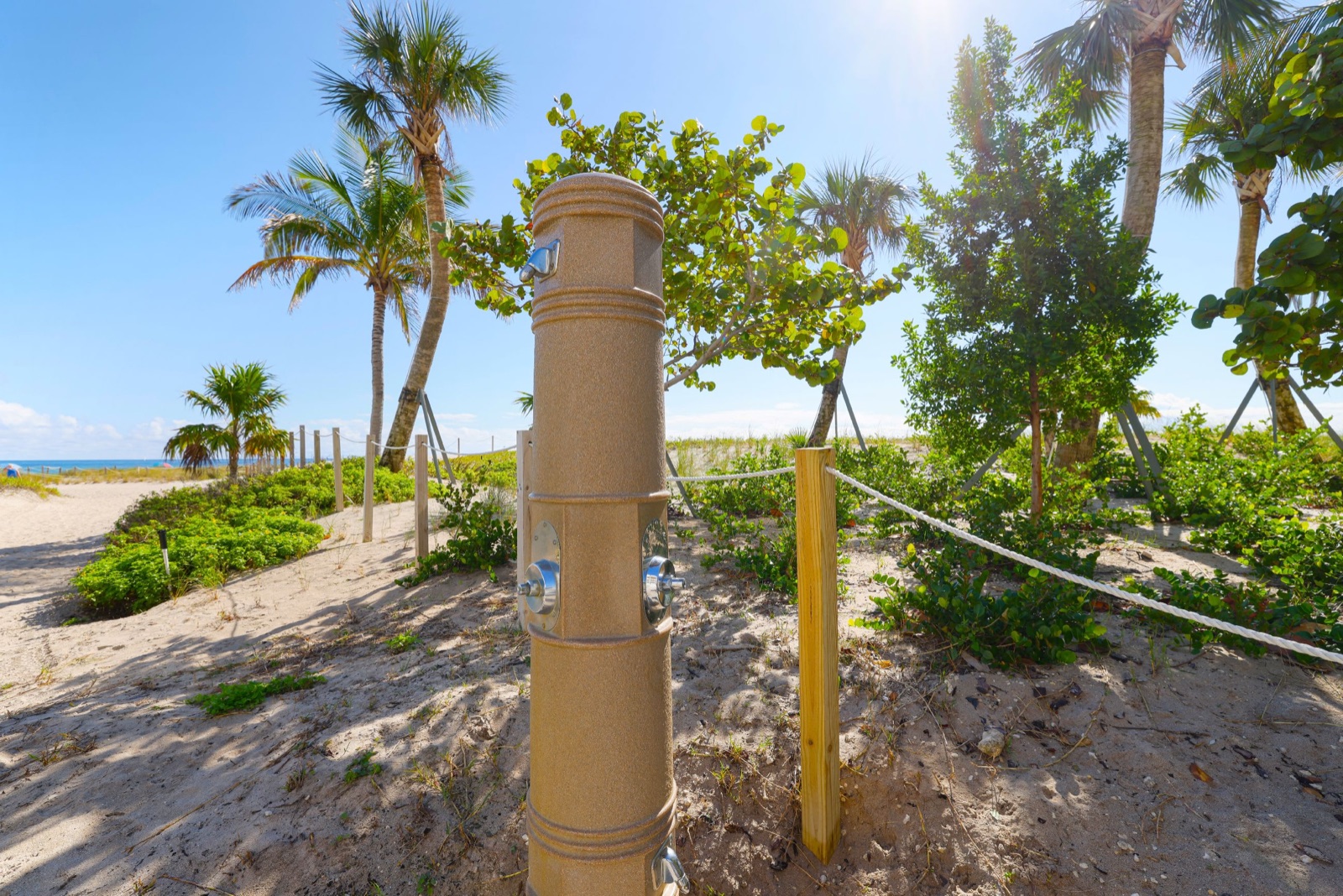 Beach shower post at the dune path near Pompano Breeze